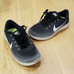 Black and White Nike Running Natural Ride Sneakers